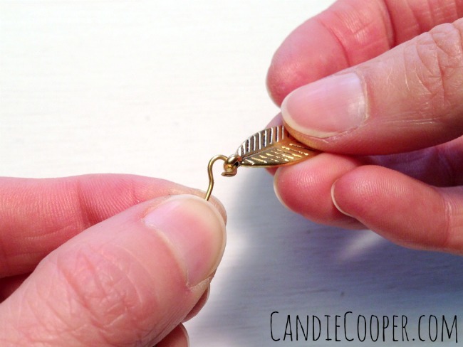 Connect a leaf charm to the eye pin